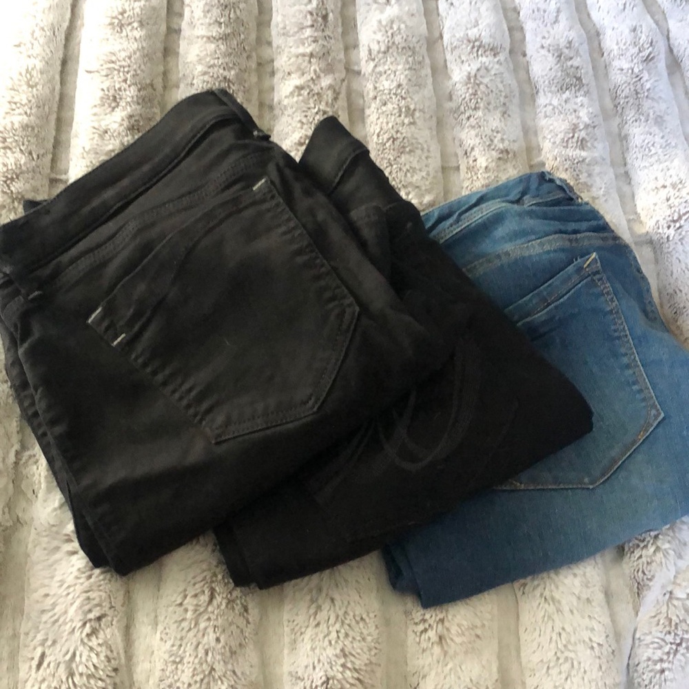 **THREE pairs** of Express Jeans - size 12